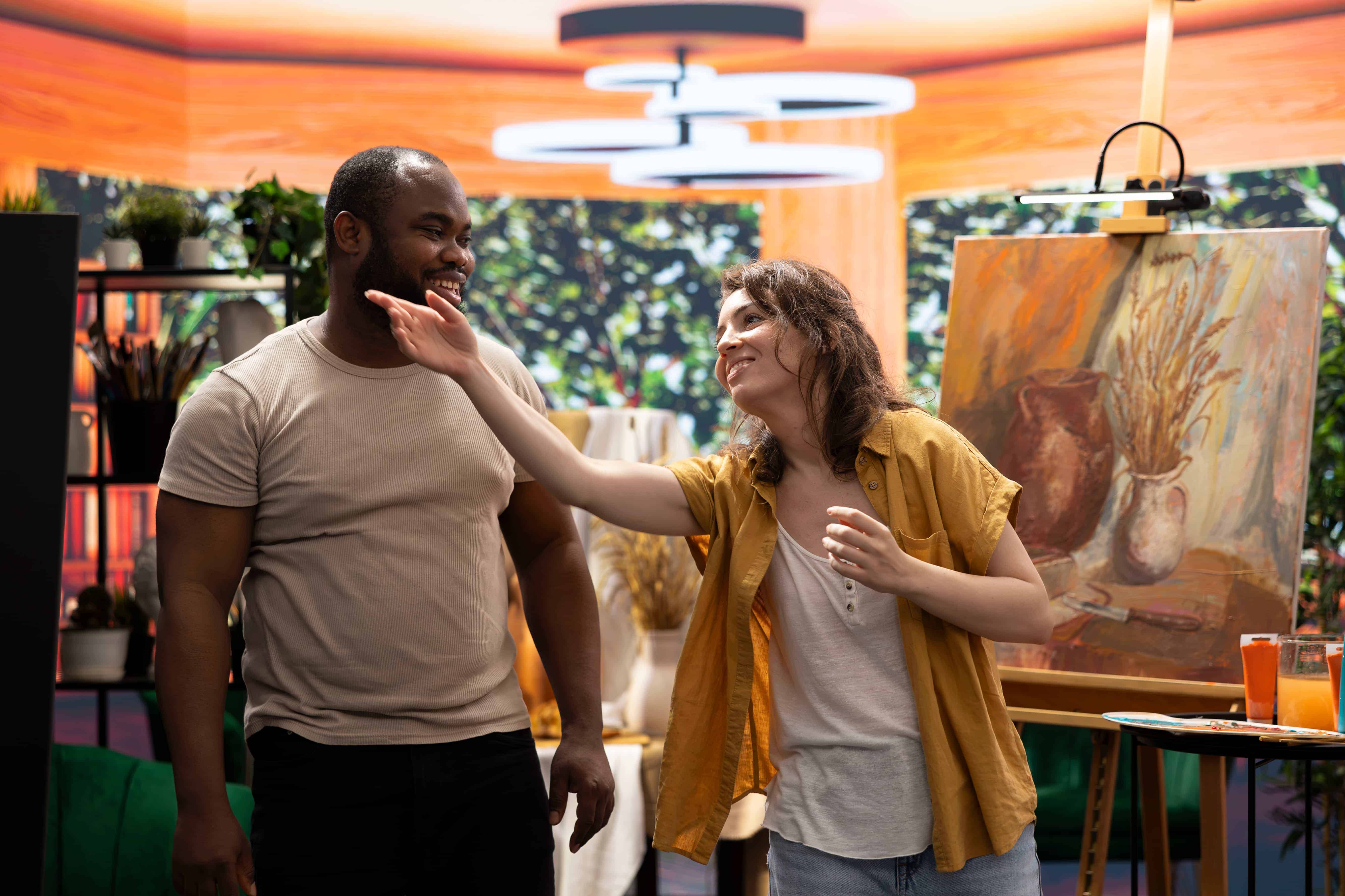 painters-team-spend-quality-time-painting-their-artistic-studio (1)